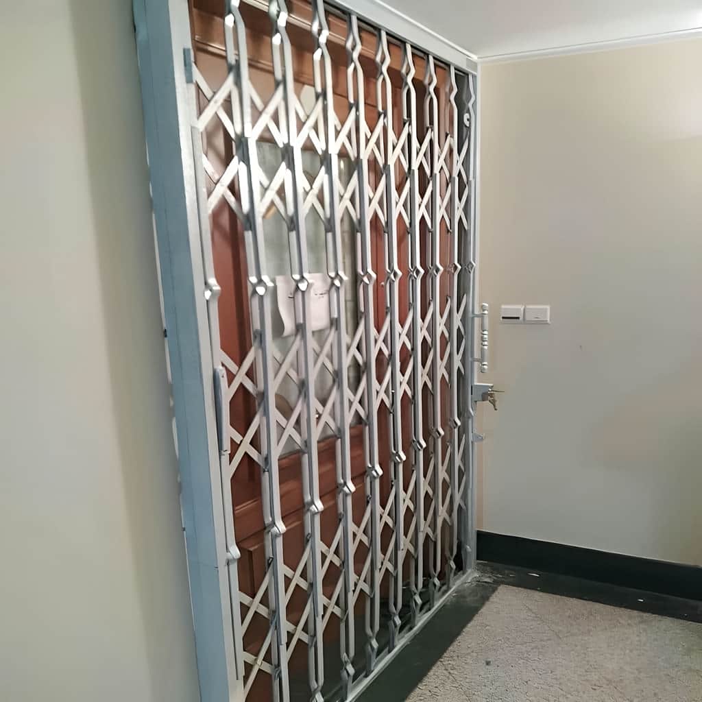 ساخت حفاظ آکاردئونی آهنی سه لوزی برای راهروی آپارتمان