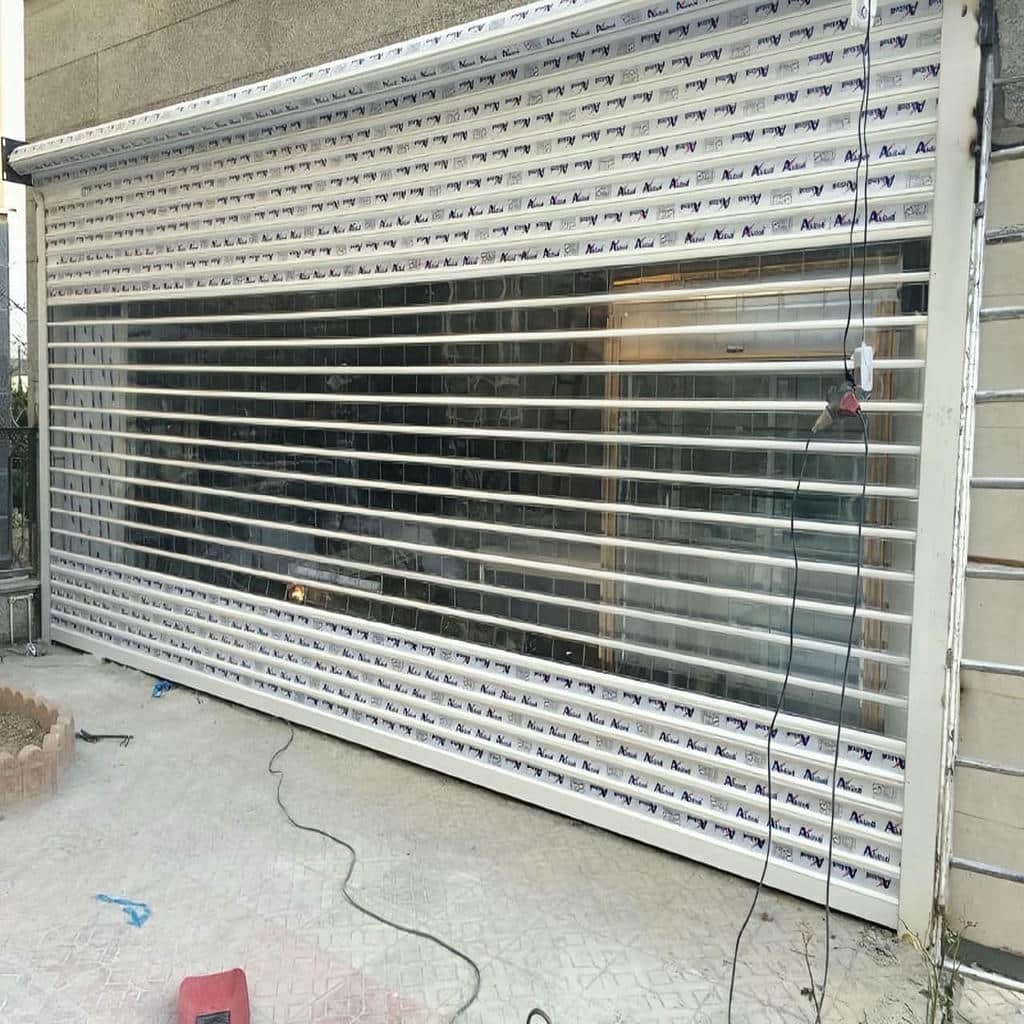 نصب درب کرکره ای پارکینگ اتوماتیک با ریل استاندارد