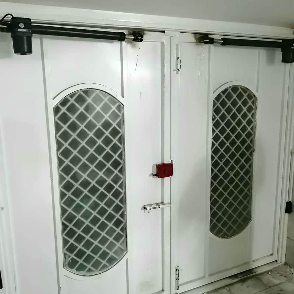 درب پارکینگ بازویی جک دار با چشمی